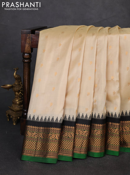 Pure gadwal silk saree cream and black with zari woven buttas and temple design zari woven border