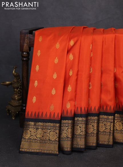 Pure gadwal silk saree orange and black with zari woven buttas and temple design zari woven border