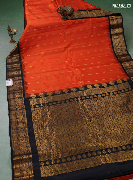 Pure gadwal silk saree orange and black with zari woven buttas and temple design zari woven border