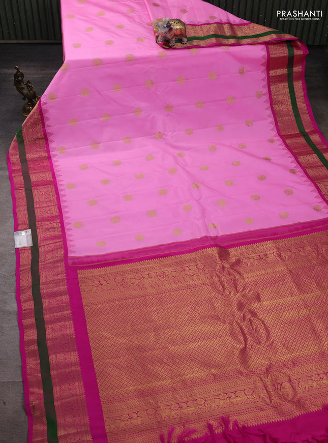 Pure gadwal silk saree light pink and pink with zari woven buttas and temple design zari woven border