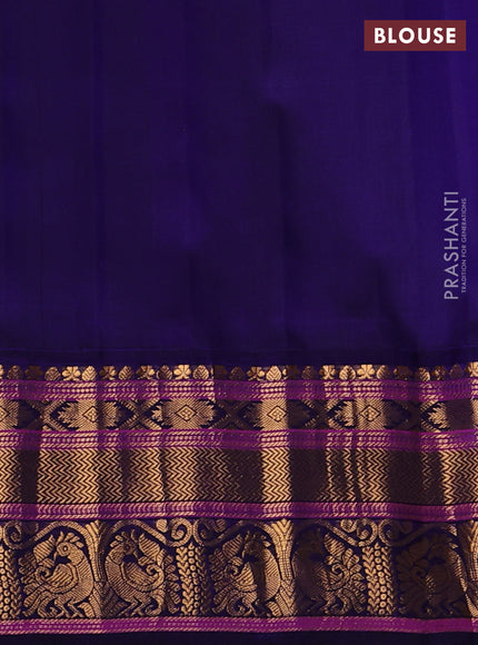 Pure gadwal silk saree green and blue with allover zari checks & buttas and zari woven border