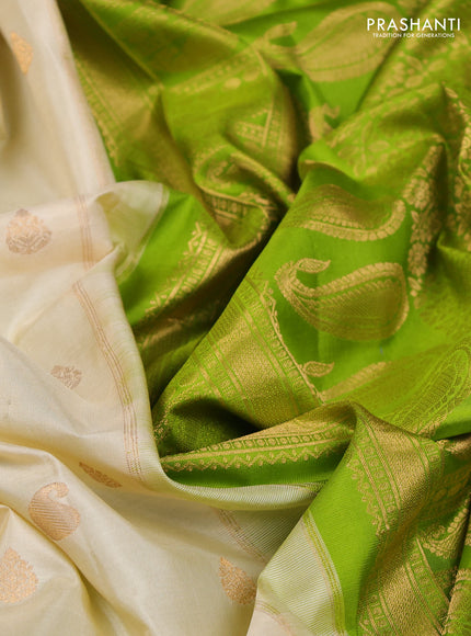 Pure gadwal silk saree cream and light green with paisley zari woven buttas and temple design zari woven border