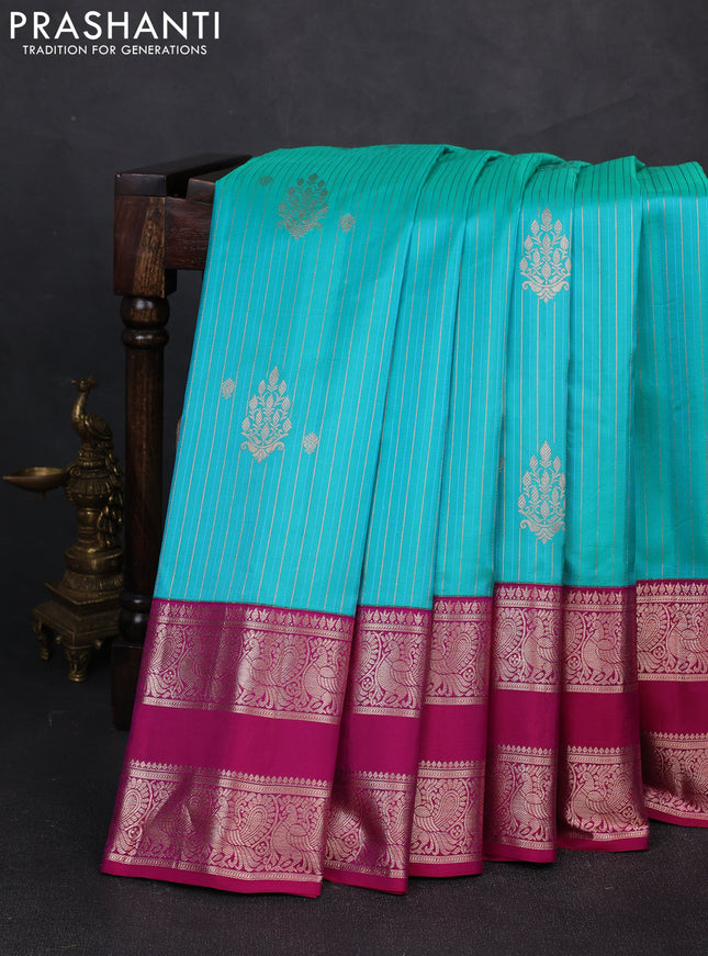 Pure gadwal silk saree teal green and purple with allover zari stripe pattern and rettapet zari woven border