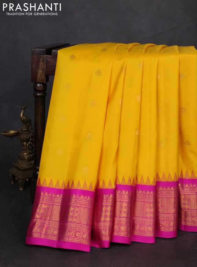 Pure gadwal silk saree mango yellow and pink with zari woven buttas and temple design zari woven border