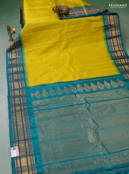Pure gadwal silk saree lime yellow and teal green with zari woven buttas and temple design zari woven border