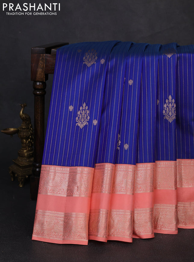 Pure gadwal silk saree blue and peach orange with allover zari stripe pattern and rettapet zari woven border
