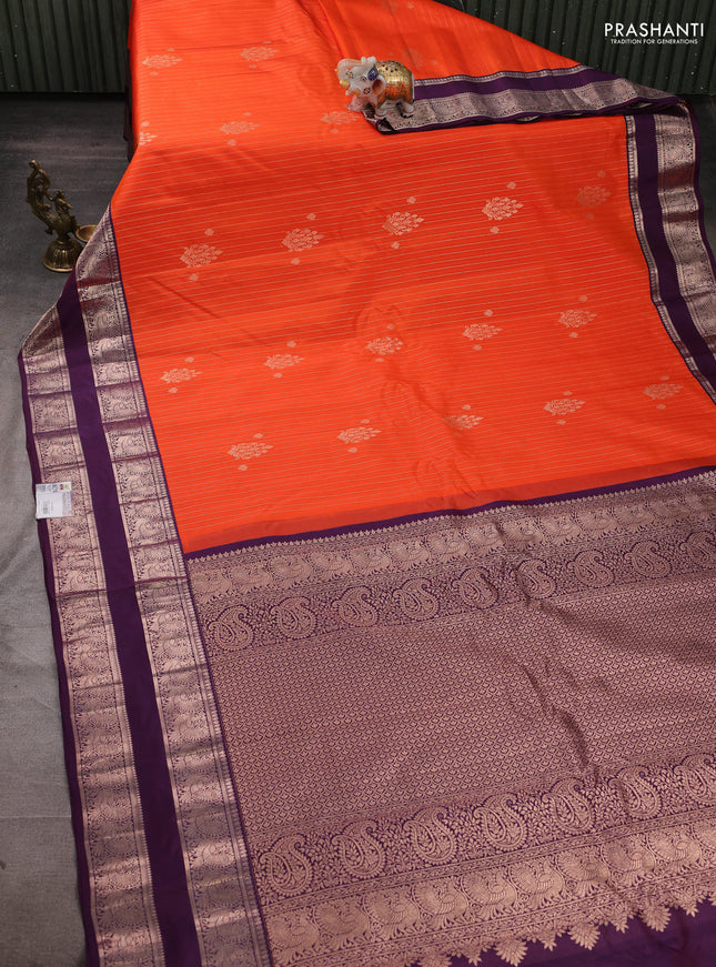 Pure gadwal silk saree orange and deep purple with allover zari stripe pattern and rettapet zari woven border