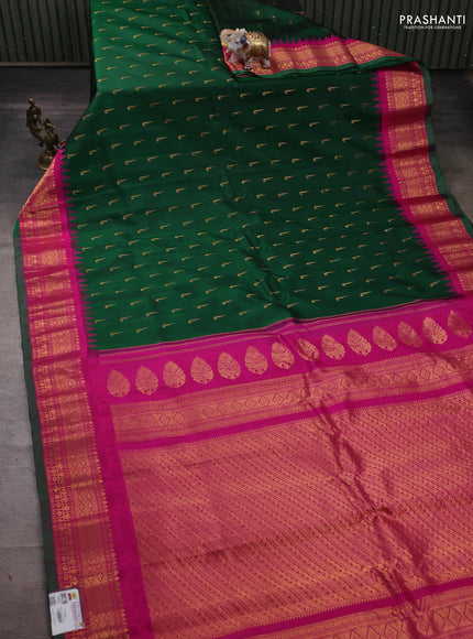 Pure gadwal silk saree bottle green and pink with zari woven muniya buttas and temple design zari woven border
