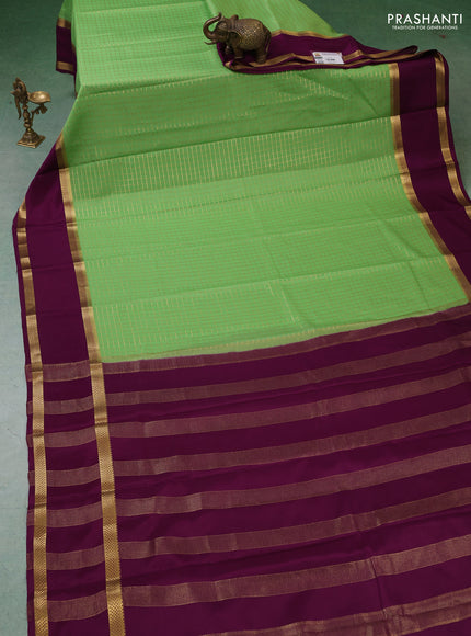 Pure mysore silk saree pista green and purple with allover zari woven checked pattern and rettapet zari woven border