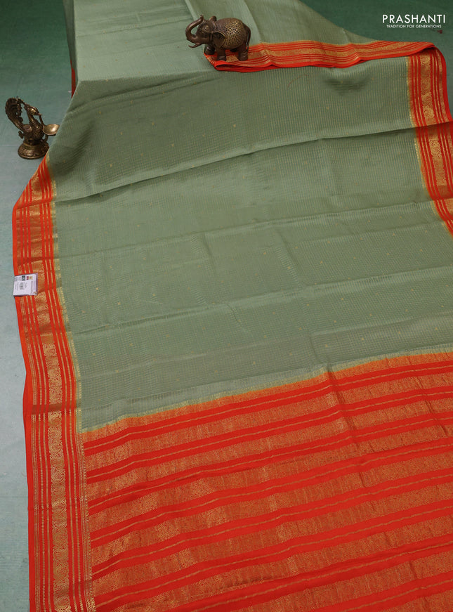 Pure mysore silk saree pastel green and orange with allover zari checks & buttas and zari woven border