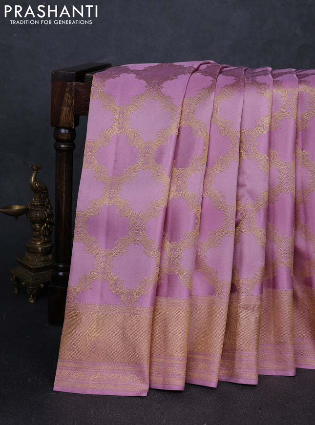 Pure Kanchipuram silk saree pastel lavender with allover zari woven brocade weaves and zari woven border