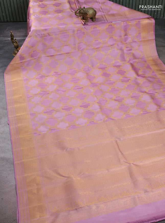 Pure Kanchipuram silk saree pastel lavender with allover zari woven brocade weaves and zari woven border