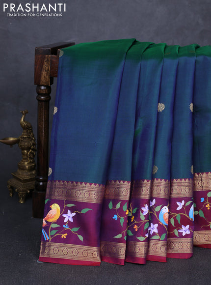 Pure Kanchipuram silk saree dual shade of greenish blue and dual shade of wine shade with zari woven annam and rettapet zari woven hand painted border & allu