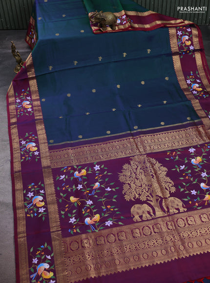 Pure Kanchipuram silk saree dual shade of greenish blue and dual shade of wine shade with zari woven annam and rettapet zari woven hand painted border & allu