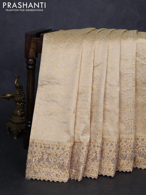 Pure Kanchipuram silk saree cream with allover zari woven brocade weaves and rich zari woven embroidery border