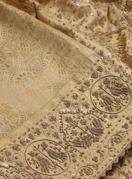 Pure Kanchipuram silk saree cream with allover zari woven brocade weaves and rich zari woven embroidery border