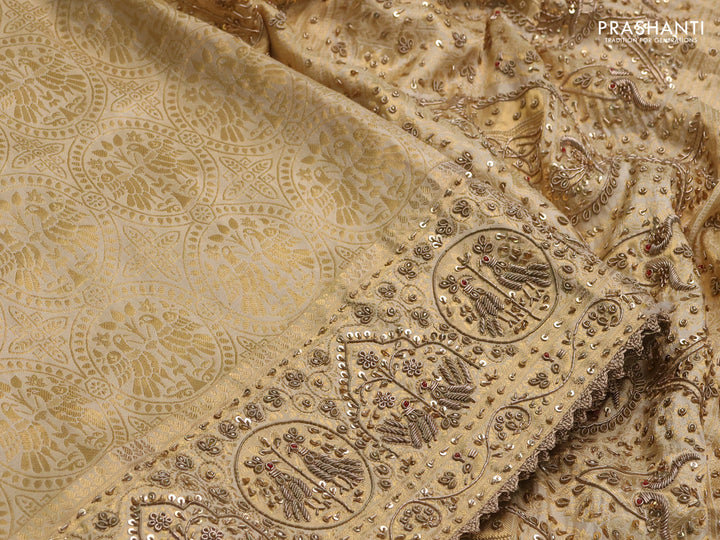 Pure Kanchipuram silk saree cream with allover zari woven brocade weaves and rich zari woven embroidery border