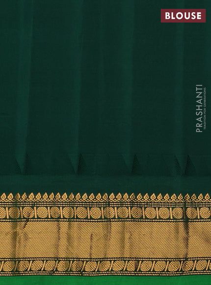 Pure gadwal silk saree yellow and dark green with zari woven buttas and temple design zari woven border