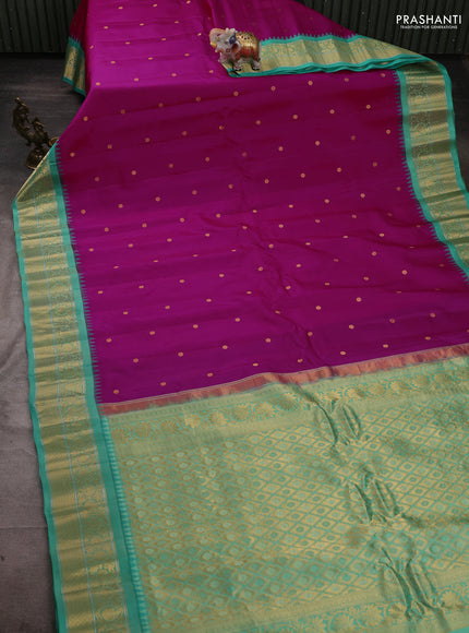 Pure gadwal silk saree magenta pink and teal green with zari woven buttas and temple design zari woven border