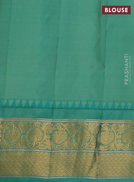 Pure gadwal silk saree magenta pink and teal green with zari woven buttas and temple design zari woven border