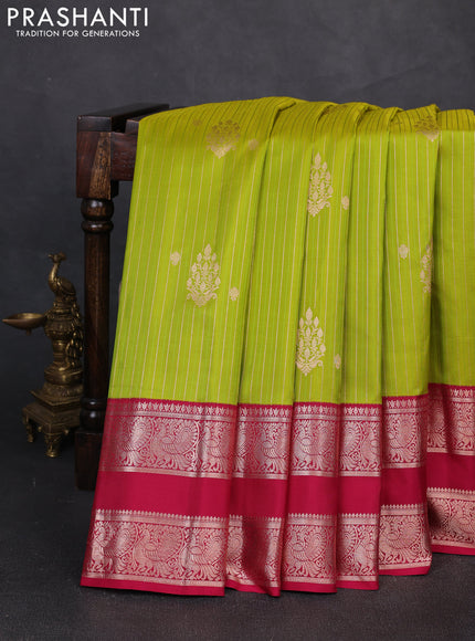 Pure gadwal silk saree light green and dark pink with allover zari stripe pattern and rettapet zari woven border