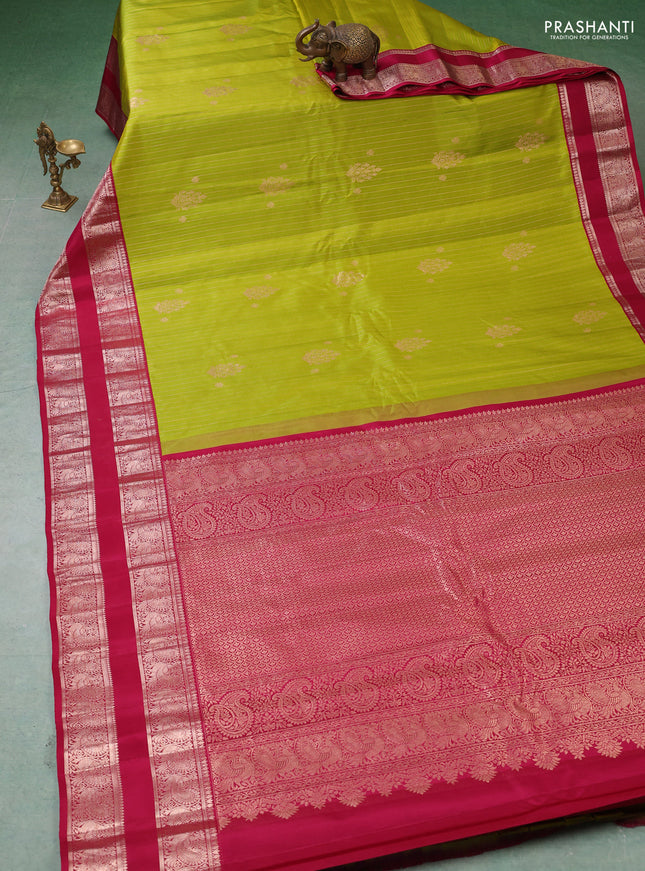 Pure gadwal silk saree light green and dark pink with allover zari stripe pattern and rettapet zari woven border