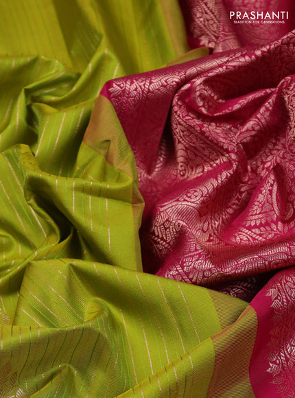 Pure gadwal silk saree light green and dark pink with allover zari stripe pattern and rettapet zari woven border