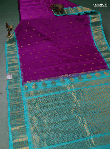 Pure gadwal silk saree purple and teal blue with zari woven buttas and temple design zari woven border