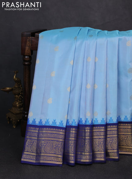 Pure gadwal silk saree light blue and blue with zari woven buttas and temple design zari woven border