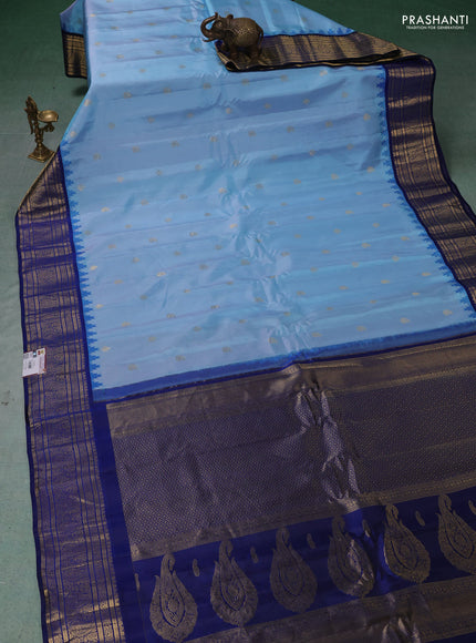 Pure gadwal silk saree light blue and blue with zari woven buttas and temple design zari woven border