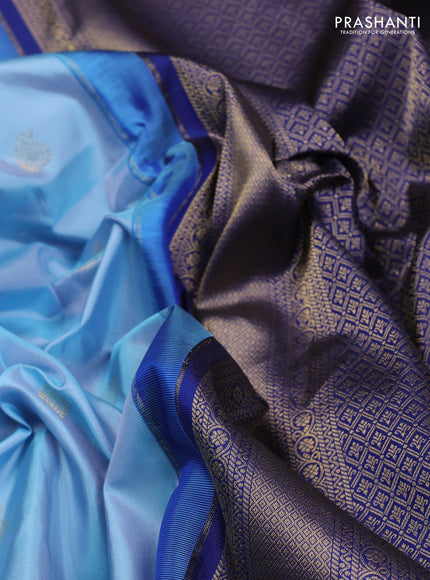 Pure gadwal silk saree light blue and blue with zari woven buttas and temple design zari woven border
