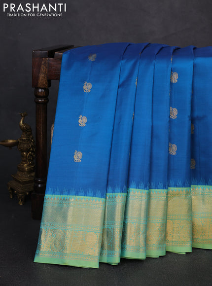 Pure gadwal silk saree cs blue and teal green with zari woven buttas and temple design zari woven border