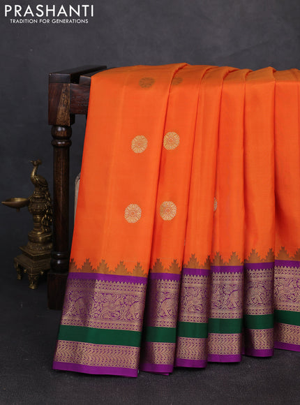 Pure gadwal silk saree orange and purple with zari woven buttas and temple design rettapet zari woven border