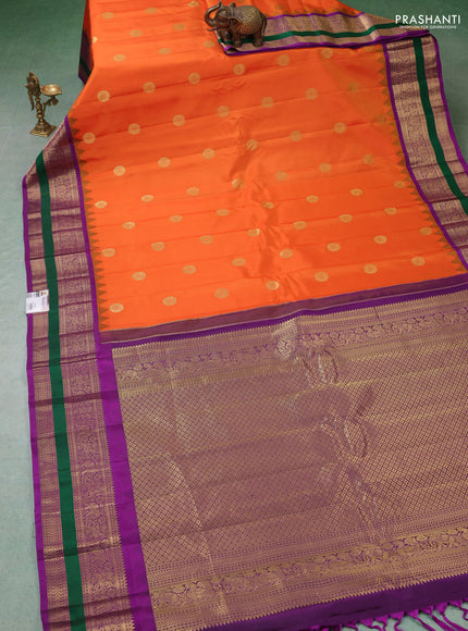 Pure gadwal silk saree orange and purple with zari woven buttas and temple design rettapet zari woven border
