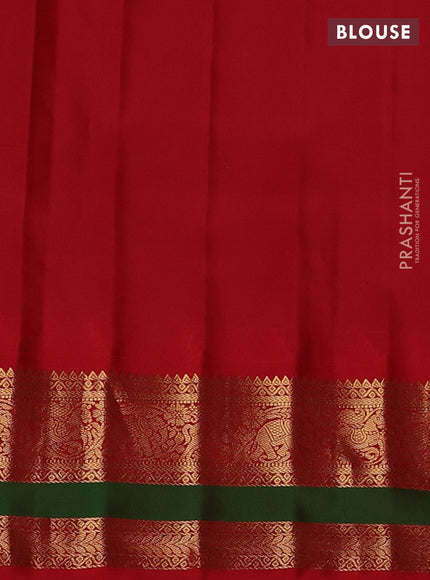 Pure gadwal silk saree mild pista green and orange with zari woven buttas and rettapet zari woven border