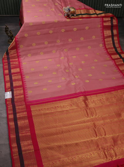 Pure gadwal silk saree peach shade and pink with zari woven buttas and temple design zari woven border