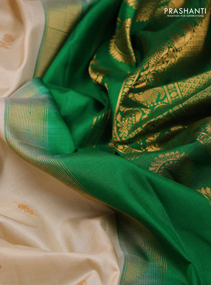 Pure gadwal silk saree cream and green with zari woven buttas and temple design zari woven border