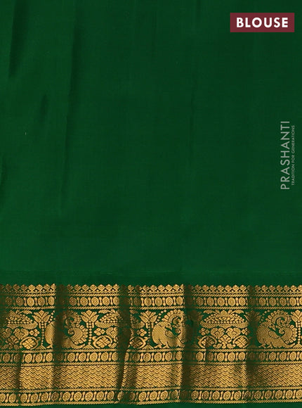 Pure gadwal silk saree cream and green with zari woven buttas and temple design zari woven border