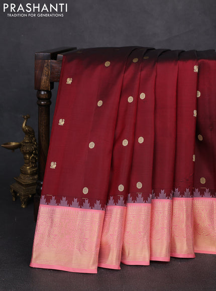 Pure gadwal silk saree maroon and peach shade with zari woven buttas and temple design zari woven border