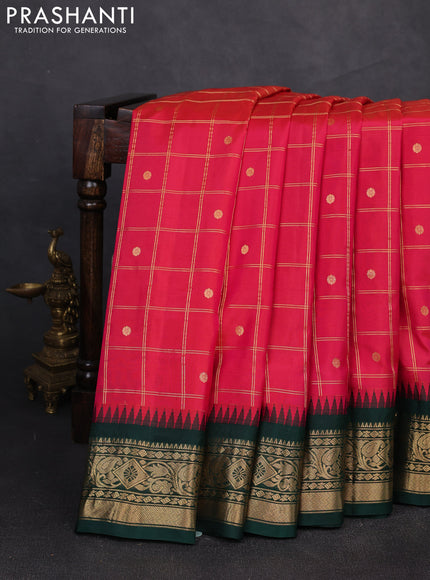 Pure gadwal silk saree pink and bottle green with allover zari checks & buttas and temple design zari woven border