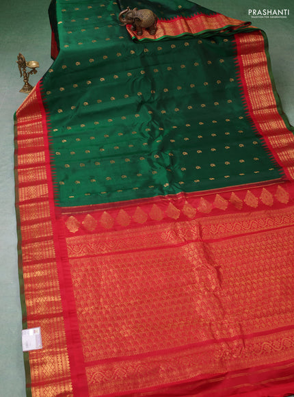 Pure gadwal silk saree bottle green and red with zari woven buttas and temple design zari woven border