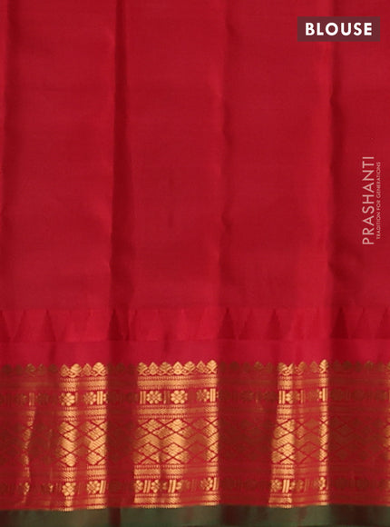 Pure gadwal silk saree bottle green and red with zari woven buttas and temple design zari woven border