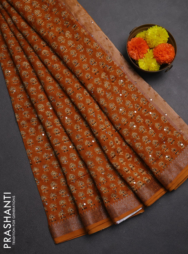 Chanderi silk cotton saree mustard yellow with allover floral butta prints & mirror work and banarasi border