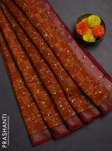 Chanderi silk cotton saree dark mustard and maroon shade with allover geometric prints & mirror work and banarasi border
