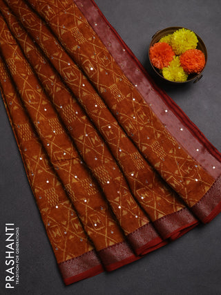 Chanderi silk cotton saree dark mustard and maroon shade with allover geometric prints & mirror work and banarasi border