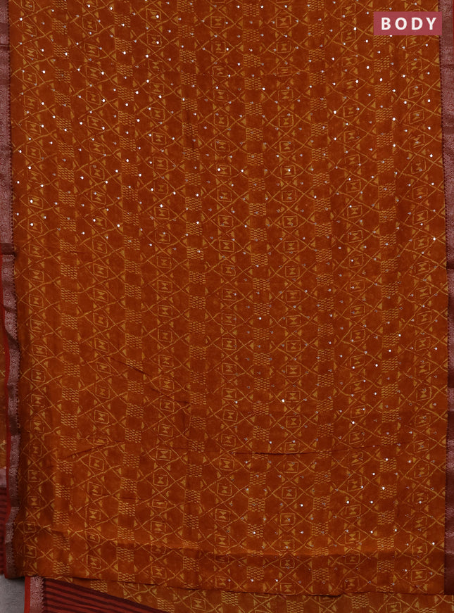 Chanderi silk cotton saree dark mustard and maroon shade with allover geometric prints & mirror work and banarasi border