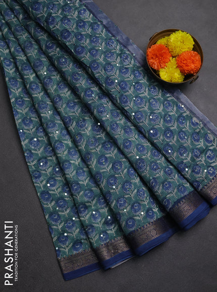 Chanderi silk cotton saree teal green and blue with allover floral butta prints & mirror work and banarasi border