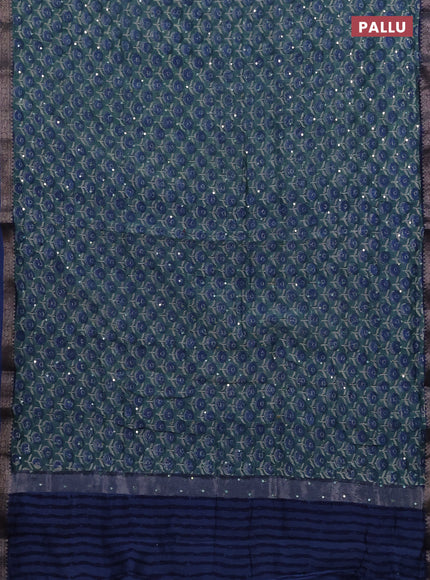 Chanderi silk cotton saree teal green and blue with allover floral butta prints & mirror work and banarasi border