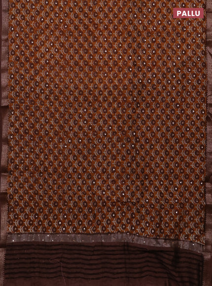 Chanderi silk cotton saree dark mustard and brown with allover floral butta prints & mirror work and banarasi border