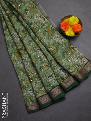 Chanderi silk cotton saree green with allover prints & mirror work and banarasi border